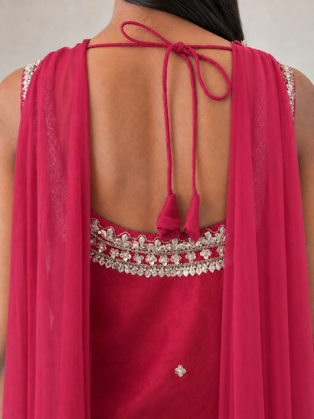 Rani pink kurta, open back with corded tie and scalloped pearl and mirror flower band