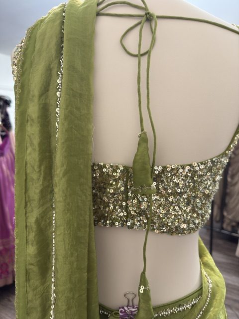 Green tissue lehenga, tie-back blouse detail