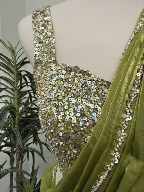Green tissue lehenga, hand-embroidered sequin bodice detail