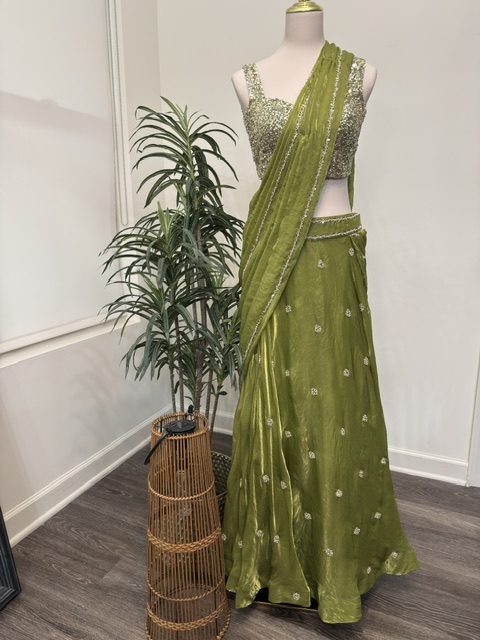 Green tissue lehenga with attached dupatta and sequin blouse, full view