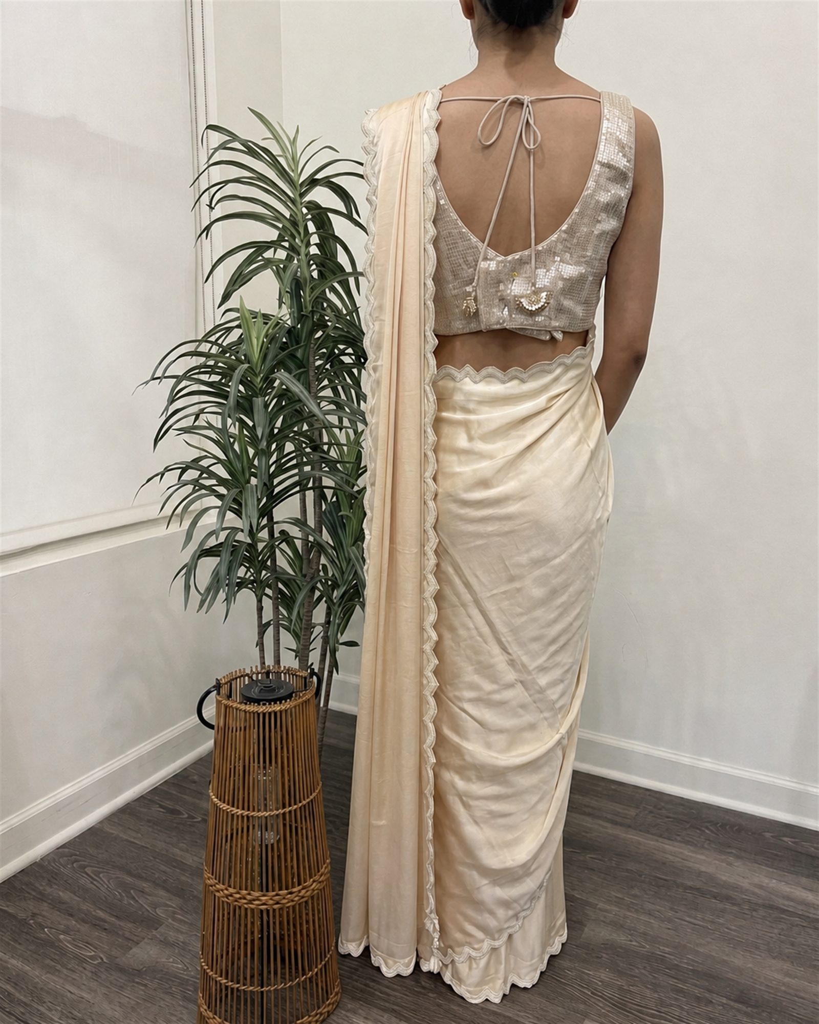 Ivory ready-to-wear saree with sequin blouse, scoop-back blouse with tie fastening, back view