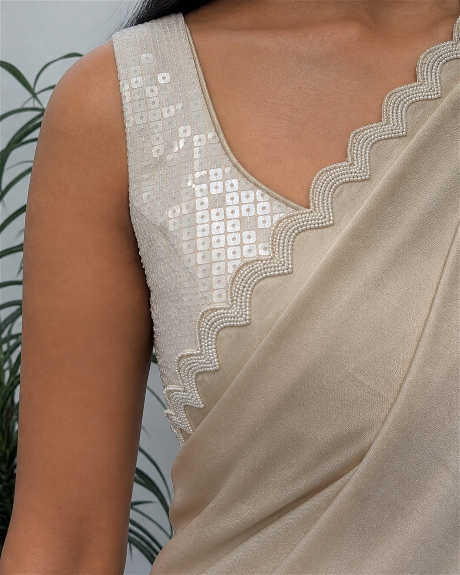 Ivory ready-to-wear saree with sequin blouse, scalloped pearl-beaded neckline and border detail
