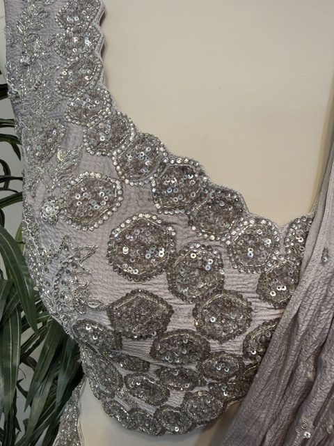 Lavender draped lehenga with embroidered blouse, blouse embroidery detail