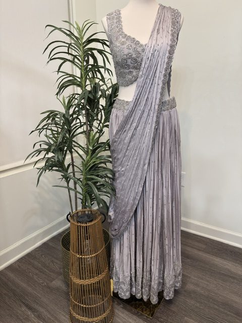 Lavender draped lehenga with embroidered blouse, full view