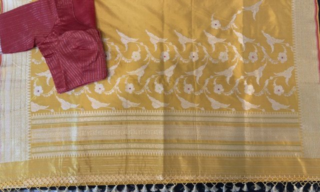Mustard yellow saree with floral vine, border detail