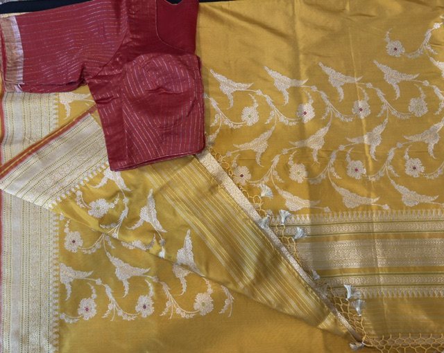 Mustard yellow saree with floral vine, full view