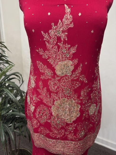 Pink short kurta, gold floral embroidery across the front