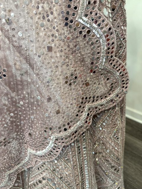 Pink tissue bridal lehenga, scalloped mirror-work border on the dupatta