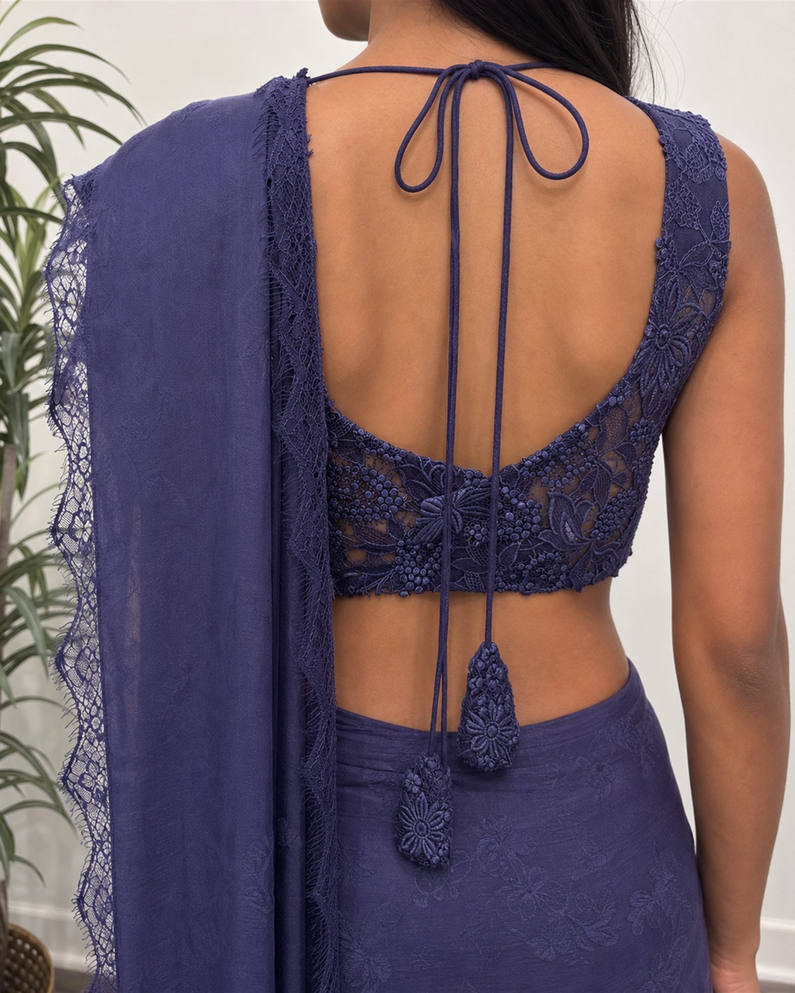 Purple lace ready-to-wear saree, scoop-back lace blouse with corded tie and tasselled ends