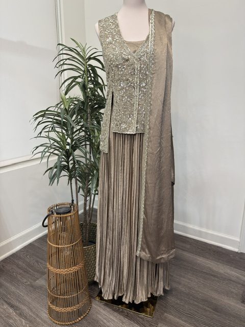 Taupe lehenga with attached dupatta and embroidered vest, full view