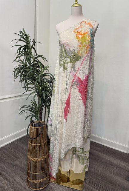 White printed one-shoulder asymmetrical top with printed pants, full view