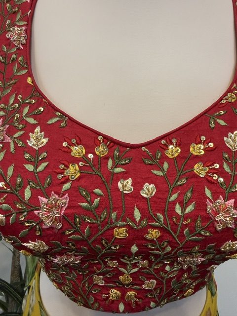 Yellow printed wide-leg pants with embroidered crop top, neckline embroidery detail