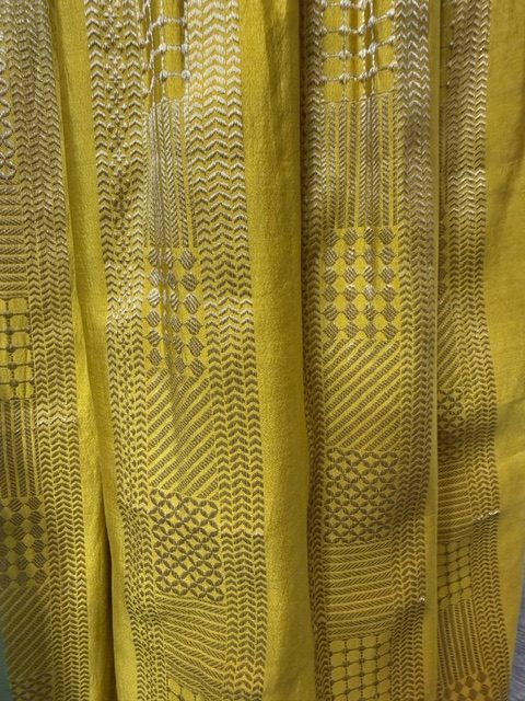 Close view of the silk brocade sharara, woven tonal gold geometric bands